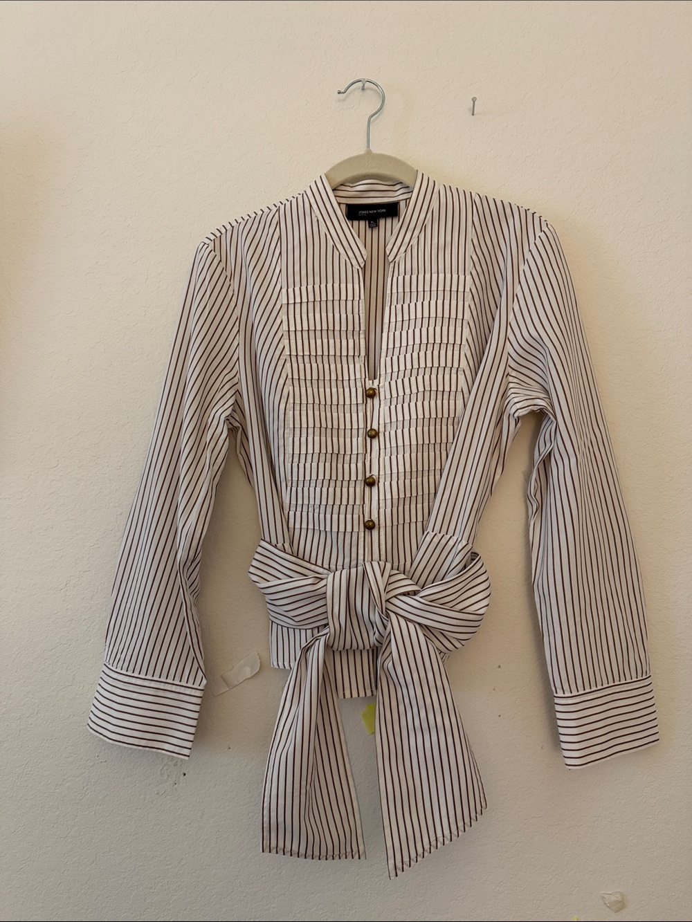 Beautiful Jones New York blouse with Caramel Stripes and bronze round buttons.
